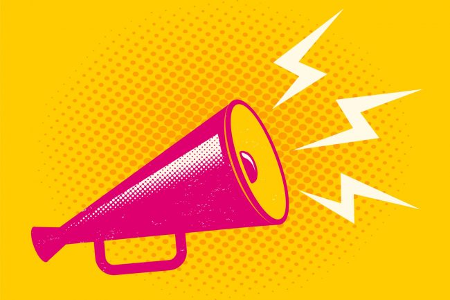 pink megaphone on halftone background